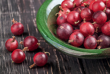 Image showing Closeup of red gooseberry in bowl