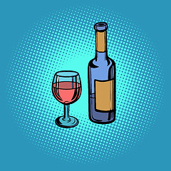 Image showing A bottle of red wine and a glass