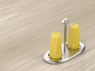 Image showing Salt and pepper shakers on silver holder