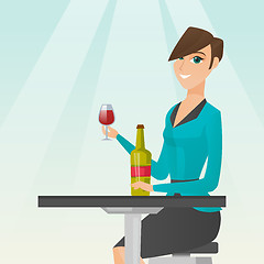 Image showing Woman drinking wine in the restaurant.