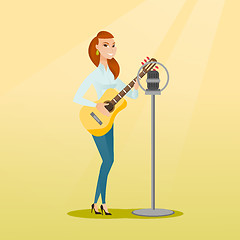 Image showing Woman singing into a microphone.