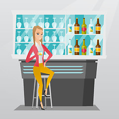 Image showing Caucasian woman sitting at the bar counter.