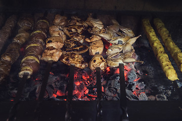 Image showing Grilling marinated shashlik