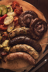 Image showing Grilled sausages with vegetables