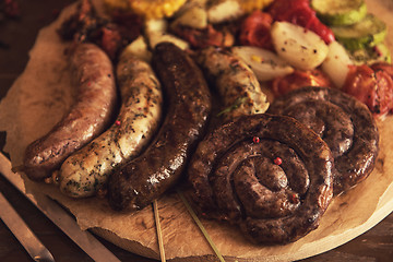 Image showing Grilled sausages with vegetables