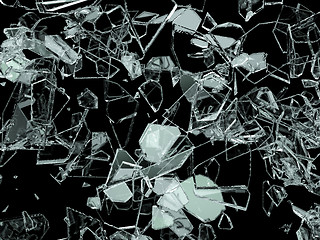 Image showing Pieces of broken or cracked glass on black