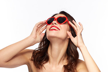 Image showing woman with red lipstick and heart shaped shades