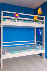 Image showing Children\'s bunk wooden bed in the interior of the room