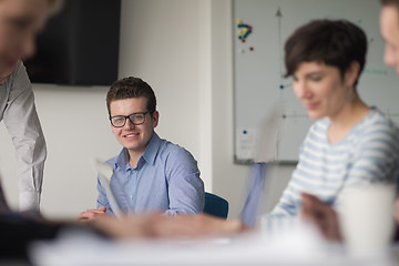 Image showing Group of young people meeting in startup office