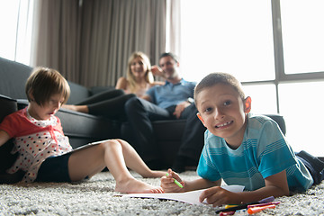 Image showing young couple spending time with kids