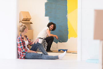 Image showing young couple doing home renovations