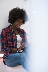 Image showing black woman using her electronic tablet