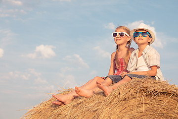 Image showing Happy children playing in the park at the day time.