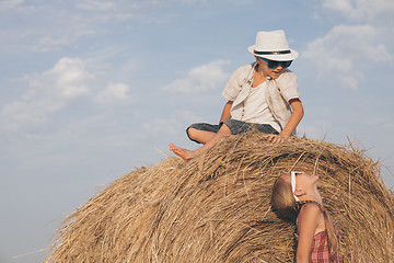 Image showing Happy children playing in the park at the day time.