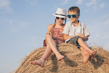 Image showing Happy children playing in the park at the day time.