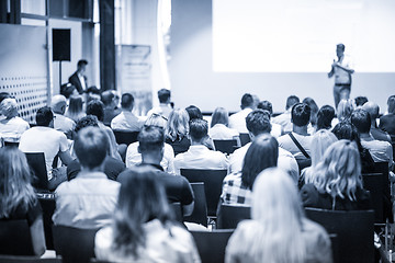 Image showing Business speaker giving a talk at business conference event.