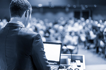 Image showing Public speaker giving talk at business event.