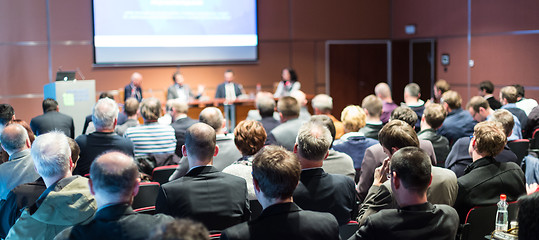 Image showing Business speaker giving a talk at business conference event.