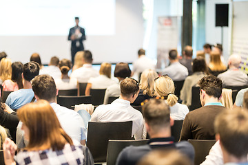 Image showing Business speaker giving a talk at business conference event.