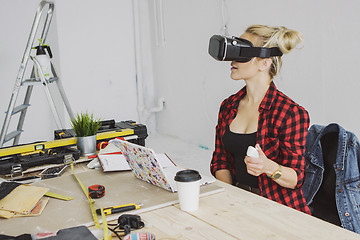 Image showing Female in virtual reality headset at laptop 