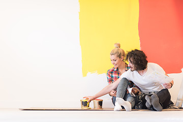 Image showing Happy young couple relaxing after painting