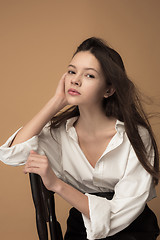 Image showing Stylish young teen girl over gray background