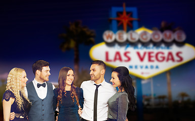 Image showing friends in party clothes hugging at las vegas