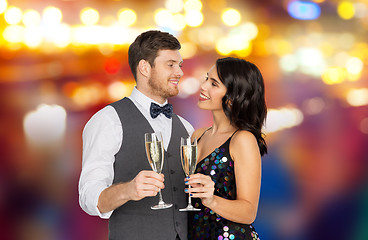 Image showing happy couple with champagne glasses at party