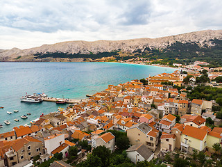 Image showing Aerial panoramic view of Baska town, popular touristic destination on island Krk, Croatia, Europe