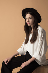 Image showing Stylish young teen girl over gray background