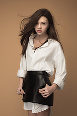 Image showing Stylish young teen girl over gray background