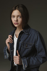 Image showing Stylish young teen girl over gray background