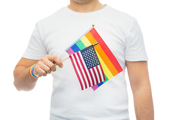 Image showing man with gay pride rainbow flag and wristband