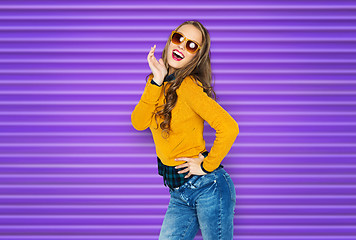 Image showing happy young woman or teen girl in casual clothes