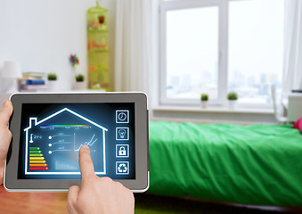 Image showing tablet pc with smart home settings on screen