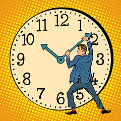 Image showing man wants to stop the clock. Time management