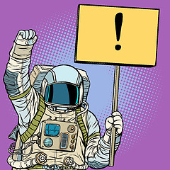 Image showing Astronaut protests with a poster