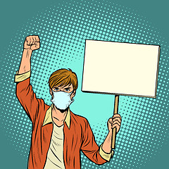 Image showing A man in a medical mask protests