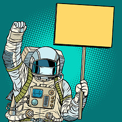 Image showing Astronaut in a medical mask protests with a poster