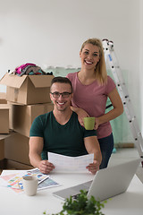 Image showing Young couple moving in a new home