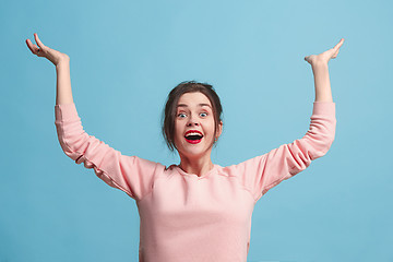Image showing Winning success woman happy ecstatic celebrating being a winner. Dynamic energetic image of female model
