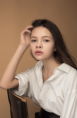 Image showing Stylish young teen girl over gray background