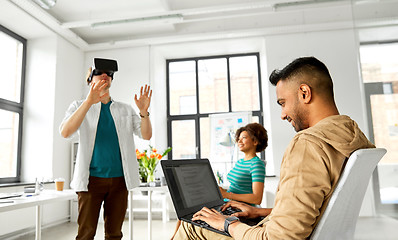 Image showing developers with virtual reality headset at office