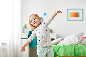 Image showing happy little girl having fun at home