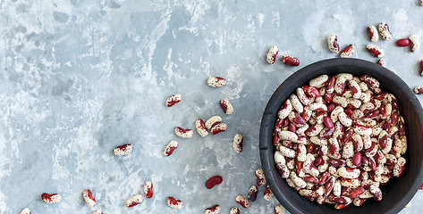 Image showing Motley beans in an old wooden bowl.