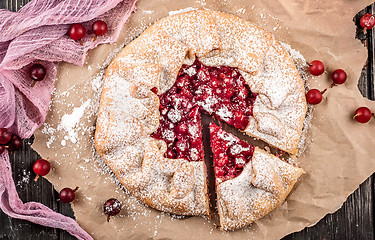 Image showing Top view of gooseberry galette