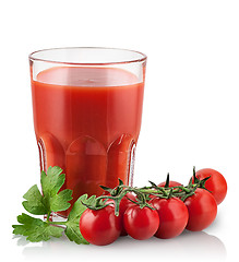 Image showing Cherry tomatoes with tomato juice