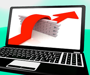 Image showing Arrow Jumping Wall On Laptop Shows Overcoming Obstacles