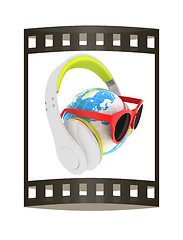 Image showing Earth planet with earphones and sunglasses. 3d illustration. The