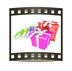 Image showing Gifts and books. 3d illustration. The film strip.